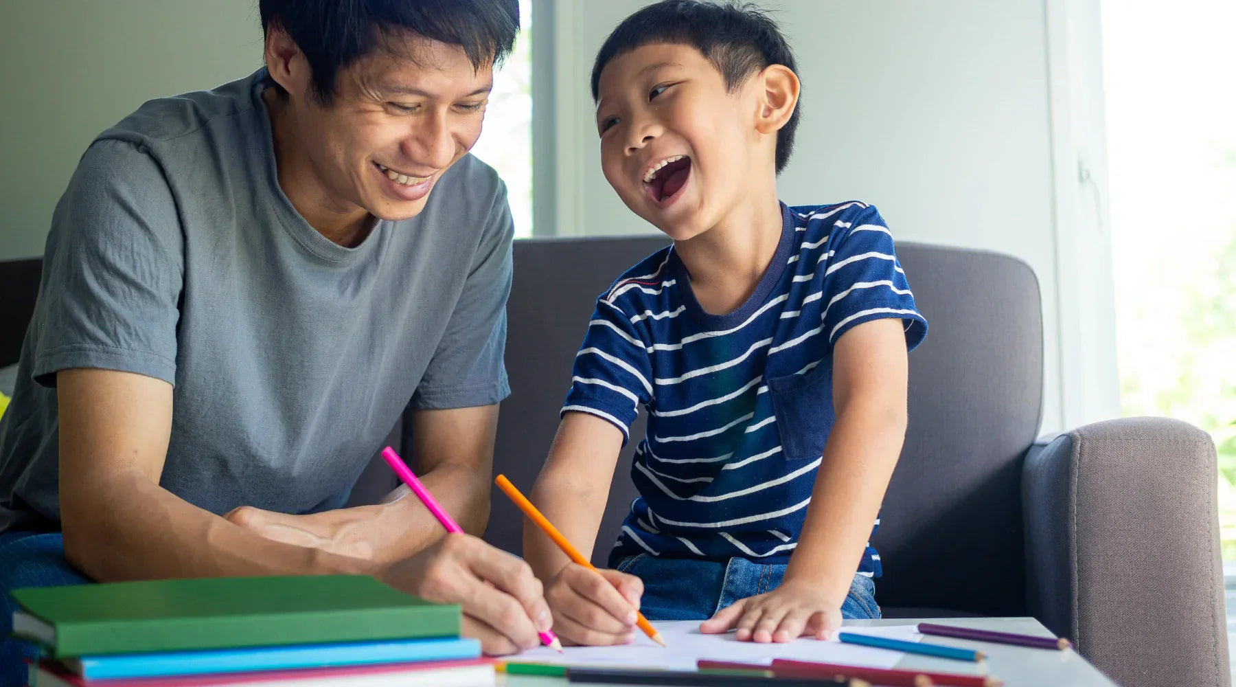 Dad and son making art