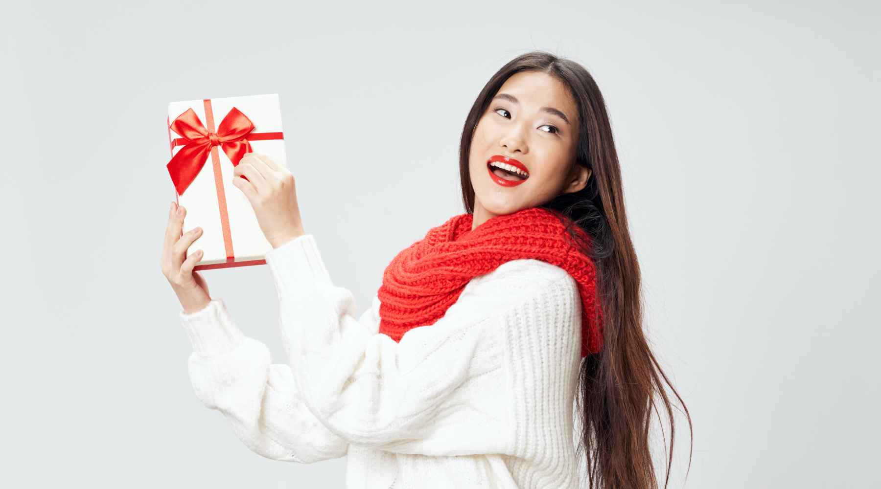 Woman holding a gift box